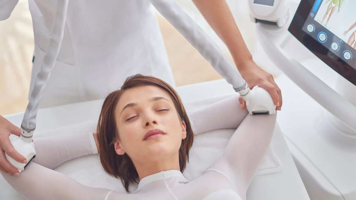 Icoone twin handpieces used on a reclining patient's arms